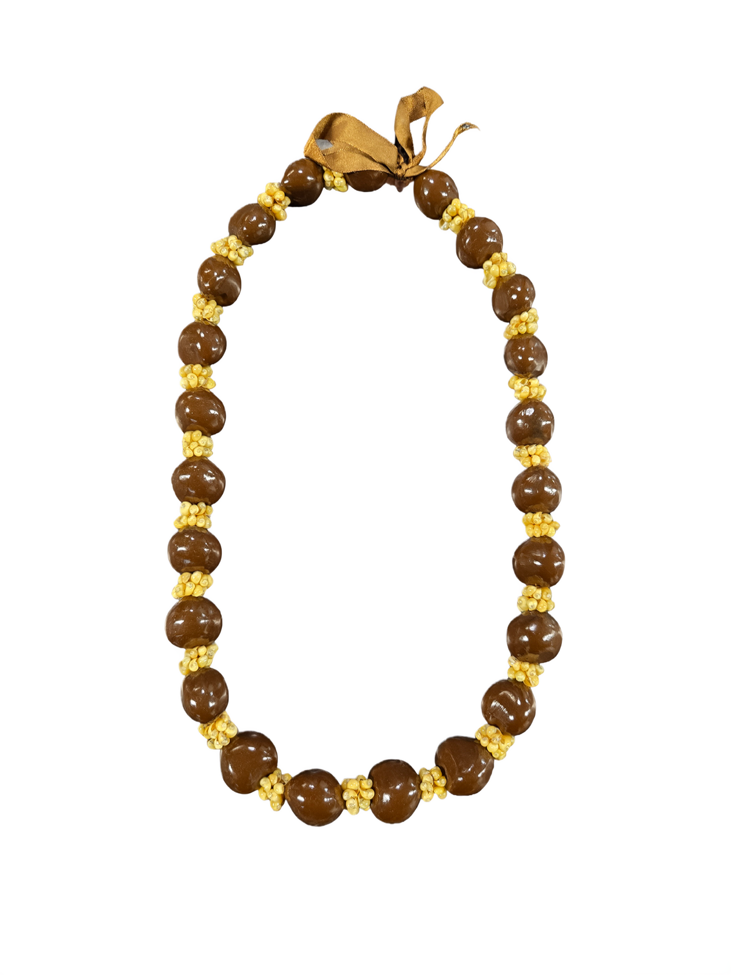 Brown kukui nut lei with shell accents and ribbon tie