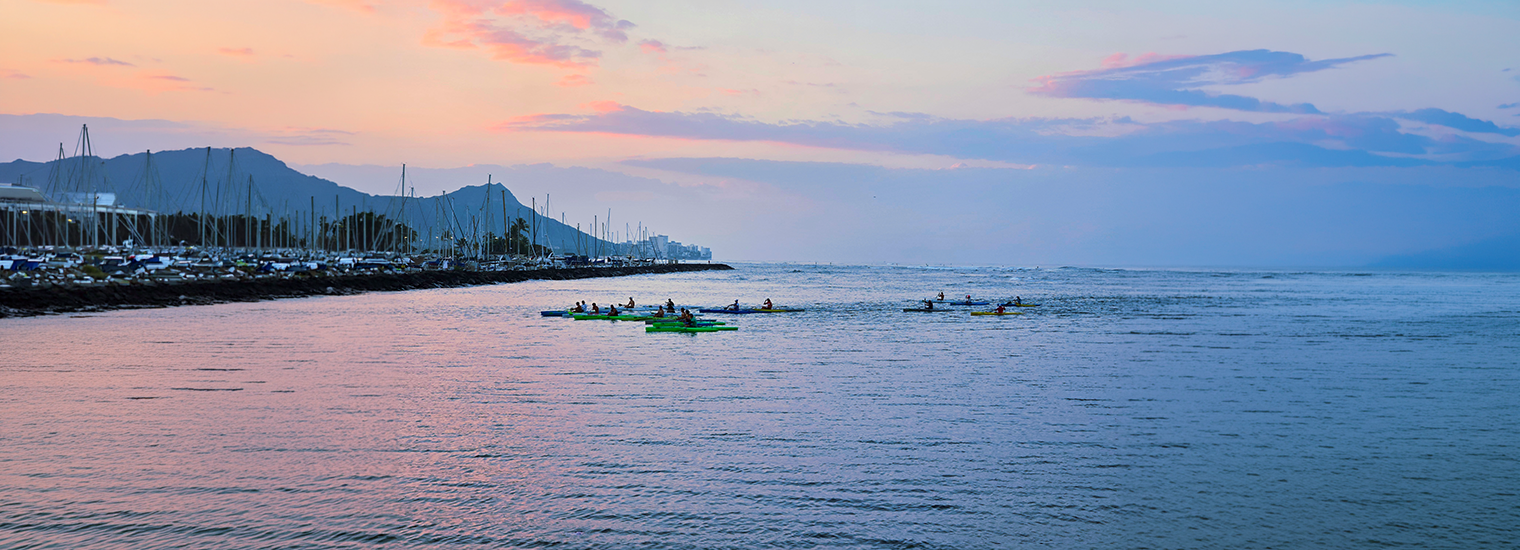People canoeing at Ala Moana beach