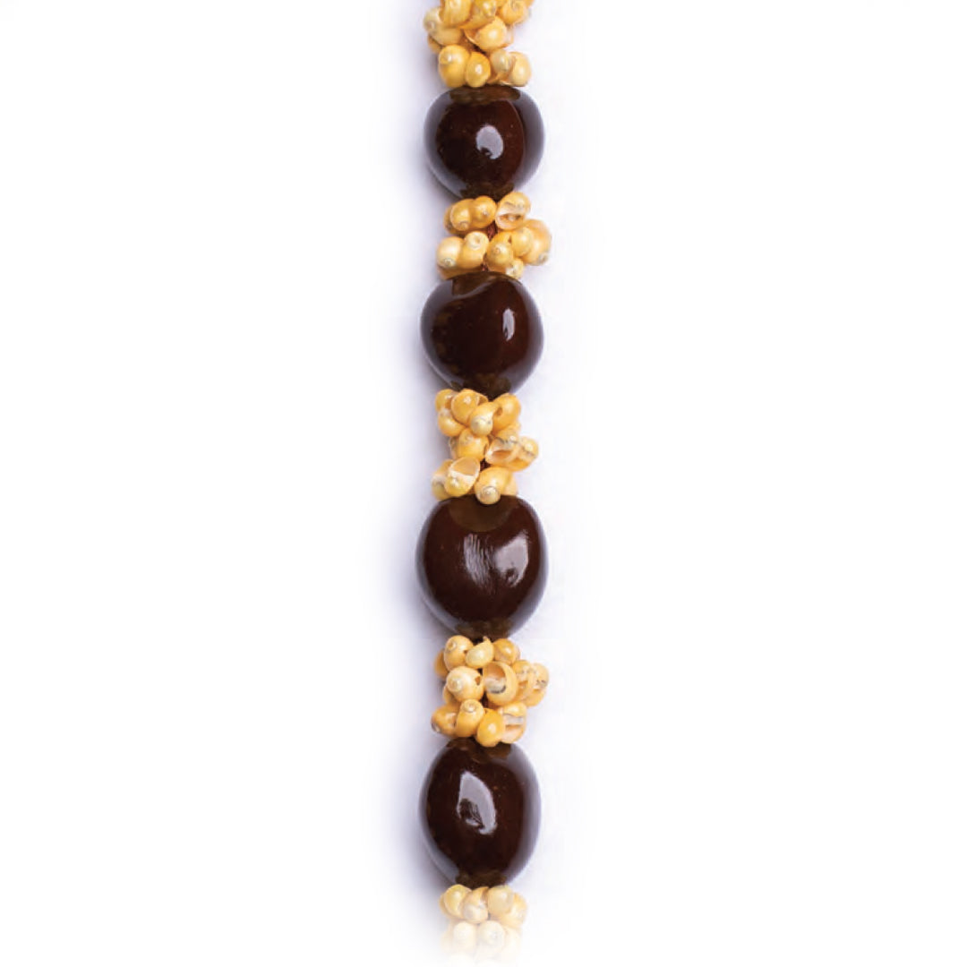 Golden Sands Kukui & Mongo Shell Lei of brown kukui nuts alternating with yellow mongo shells